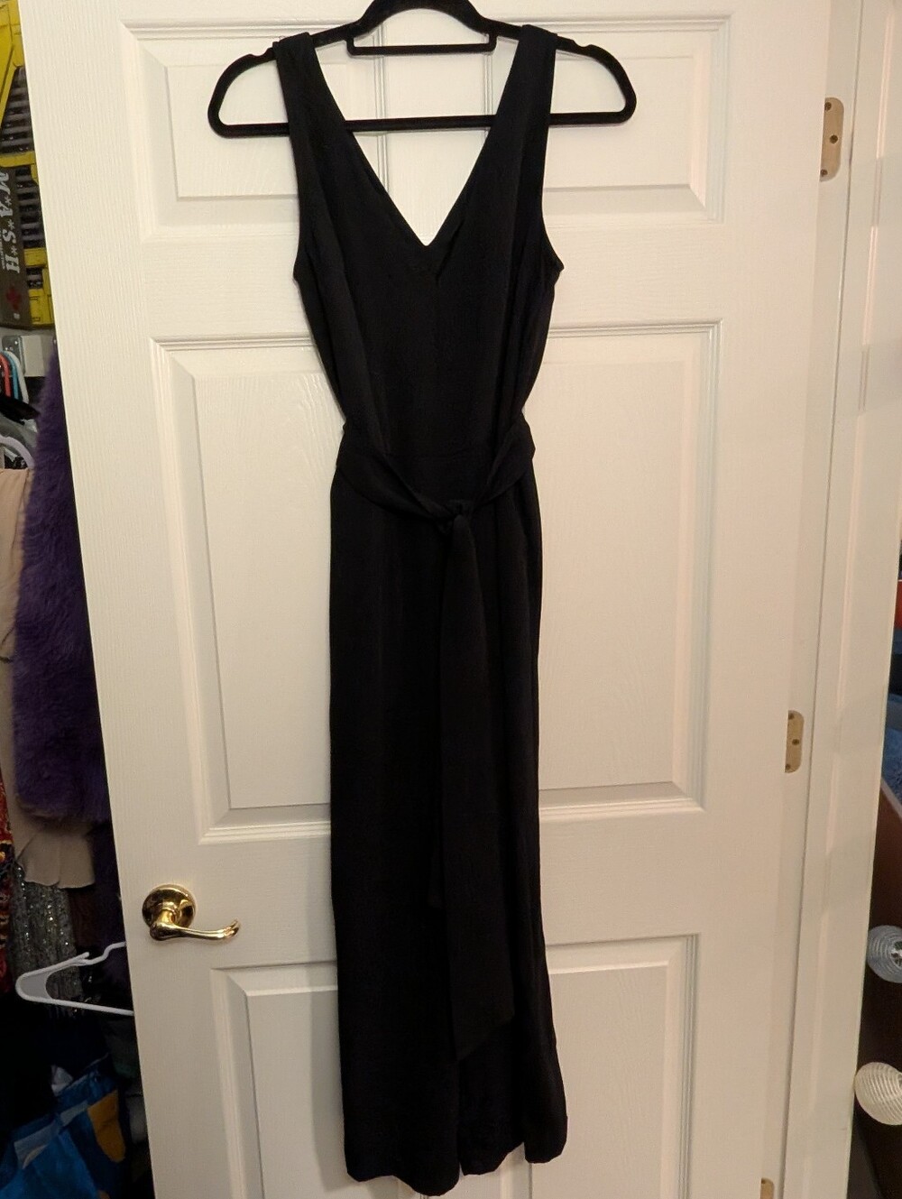 Black Sleeveless V-Neck Wide Leg Jumpsuit with Pockets And Waist Tie